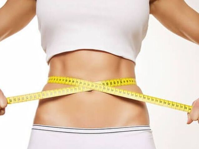 Taille vun der Taille mat engem Zentimeter Bändchen