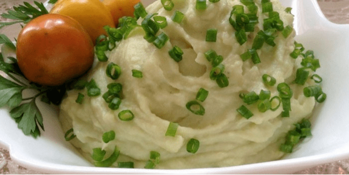 Purée gemaach vu faarwege Kabes mat Tomaten